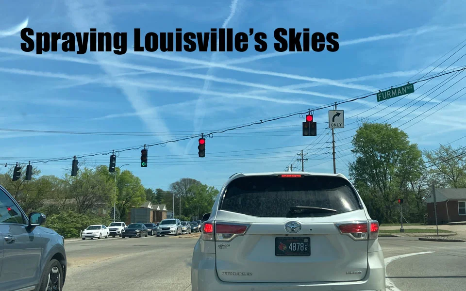 spraying Louisville skies